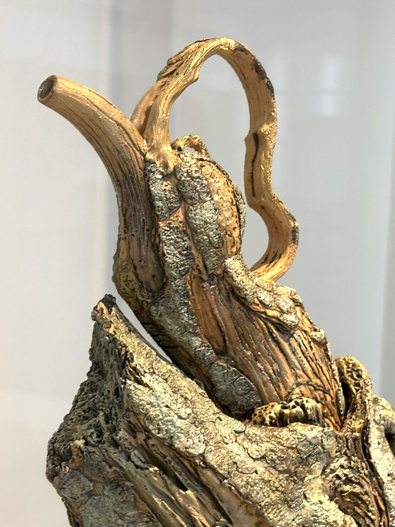 teapot that looks like it's made of wood.